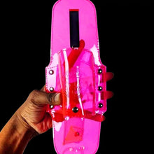Person demonstrating pink drink holster with credit card slot perfect for concerts and hands-free festival experience