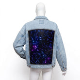 Blue wash Galaxy Denim Jacket back view with glowing LED starfield galaxy panel - Neon Cowboys light-up denim