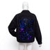 Black-wash Neon Cowboys Galaxy Denim Jacket back with an unlit blue and purple starfield print panel on a mannequin, a glowing led starfield light up denim jean jacket for music festivals and concerts, a space cowgirl and disco cowgirl statement piece for raves, Neon Cowboys
