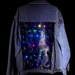 Universe Galaxy LED Panel Detail on Denim Jacket - Close-Up of Light Up Back Design - Color Changing Starry Effect on Jean Jacket - Fashion Technology Brand Neon Cowboys - Space Cowgirl Outfit for Fun Night Out - Glow Event Party