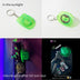 Green and blue cowboy hat keychains showing before and after UV light exposure with bright glow effect for nighttime events