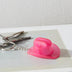 Pink cowboy hat keychain bottle opener on set of keys demonstrating practical festival accessory for camping and outdoor concerts