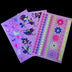Multiple glow-in-the-dark tattoo sheets with floral and butterfly designs - Set of temporary UV-reactive body art for music festivals