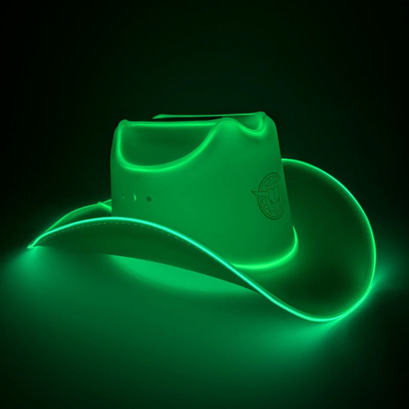 Green glowing LED light-up cowboy hat on a dark studio backdrop, a green led cowboy hat and neon cowboy hat perfect for luxury event planning, western themed parties and fashion celebrations, a glow in the dark cowgirl hat for raves, country concerts and bachelorette parties, Neon Cowboys