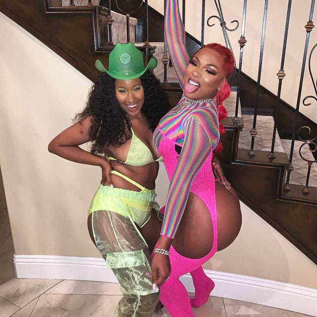 Green cowboy hat with bright LED lights glowing for Meg Thee Stallion hot girl summer vibes and western costume fashion