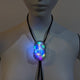 LED bolo tie worn on mannequin showing placement - Illuminated multicolored western accessory for music festivals, country concerts, rodeo events, and futuristic cowboy costumes