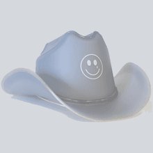 White Kacey Musgraves LED cowboy hat showing smiley face detail perfect for country music festivals and Golden Hour tour fan merchandise collection