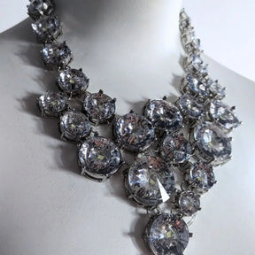 Silver chunky rhinestone necklace in non-illuminated state showing versatile day-to-night transition from elegant daytime jewelry to evening statement piece