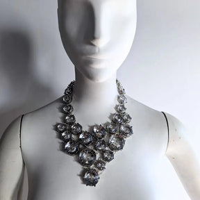 Clear silver rhinestone statement necklace on woman showcasing elegant crystal design for wedding jewelry bridal accessories and formal evening wear with classic elegance