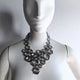 Clear silver rhinestone statement necklace on woman showcasing elegant crystal design for wedding jewelry bridal accessories and formal evening wear with classic elegance