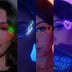 Four-panel collage of models wearing glowing LED light-up face stickers and led face jewelry in green, blue and pink at a rave, led face gems and festival makeup for raves, EDM concerts, Coachella and Pride, Neon Cowboys