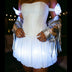 Close-up of a Neon Cowboys LED Fairytale Dream Dress corset bodice and white glowing bubble skirt with a fringe jacket, a light up dress and led rave outfit stagewear for showgirls, burlesque performers and drag queens, a dreamy festival outfit for raves, Pride and weddings, Neon Cowboys