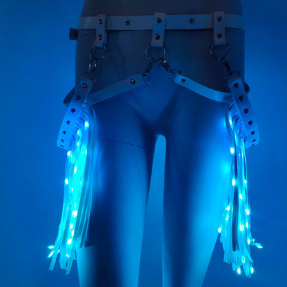 Blue LED Fringe Garter Belt on woman's legs - Illuminated thigh accessory for EDM concerts, theatrical performances and burlesque shows