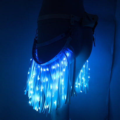 Blue LED Fringe Garter Belt in nightclub - Illuminated thigh accessory for Vegas nights, cruise ship parties and nightlife photography