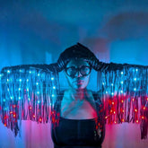 LED Fringe Gloves glowing blue and red — opera-length color-changing light-up gloves with LED fringe down the arms, worn for raves, festivals and stage performances.