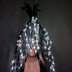 LED Fringe Gloves worn with glowing white light-up fringe cascading down — opera-length color-changing rave gloves shown lit up for stage and festival performers.