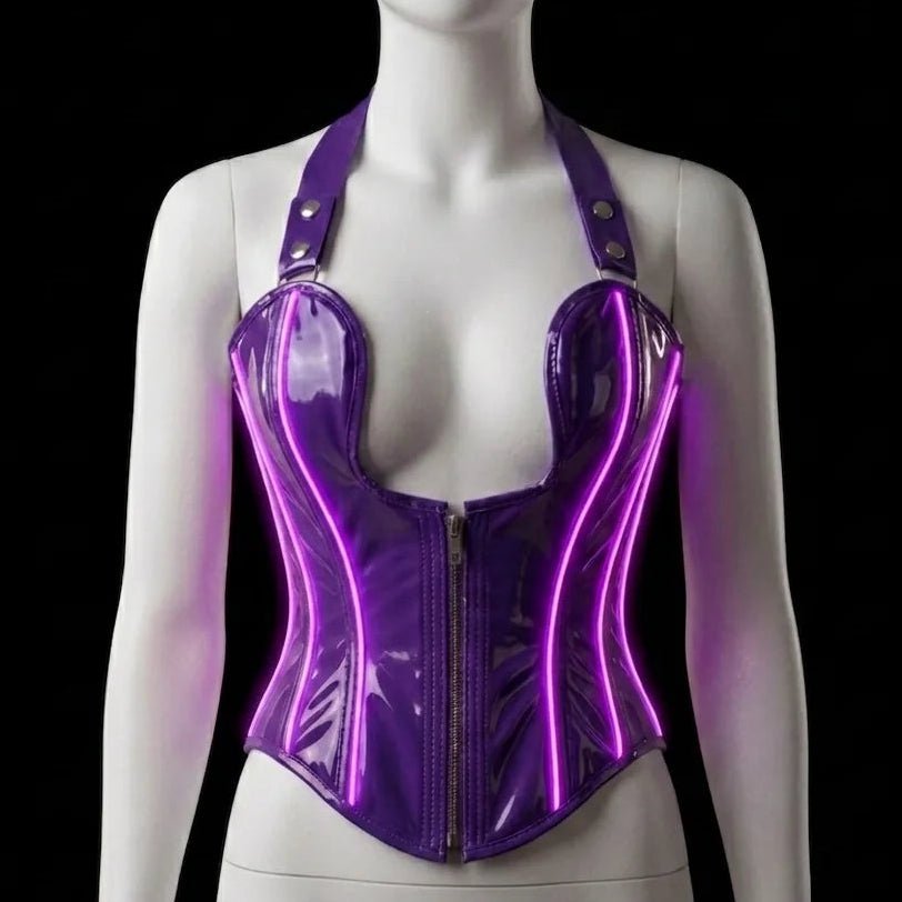 Neon Cowboys purple LED light-up PVC halter corset with vivid magenta glowing neon-wire piping along the boning, zip-front sweetheart halter on a mannequin — made-to-order light-up drag and nightclub corset for Pride performers, witchy gothic looks and galaxy bachelorette parties, glowing club wear by Neon Cowboys