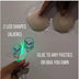 Two glowing green LED alien shapes next to silicone pasties — light-up alien nipple covers you glue onto any pasties or bra