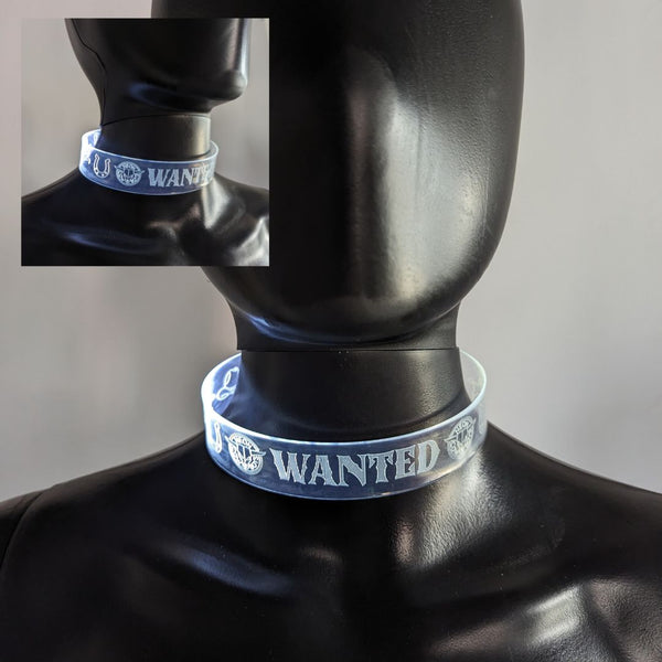 Person modeling bright blue light up WANTED choker at night event showing how the LED necklace enhances Halloween costumes and festival outfits for unique party style and glowing fashion