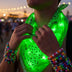 Man at a festival at sunset tying on a green glowing LED light-up bandana with kandi bracelets, neon bandana and led bandana for a rave, EDC or music festival, glow western accessory, Neon Cowboys