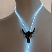 Light blue glowing bolo tie on neutral background showcasing elegant illuminated western accessory for formal events and evening parties