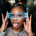 Woman holding blue glowing LED cyber glasses in a graffiti hallway at night, futuristic light up glasses and cyberpunk led glasses for raves, music festivals, EDM concerts, nightlife, and cosplay, Neon Cowboys