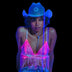 Woman wearing pink light up fringe bralette with blue cowboy hat creating stunning glow effect perfect for rodeos country music festivals and western themed parties