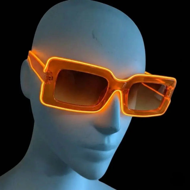 Orange glowing LED light up square party sunglasses shown on a mannequin head against a black background, illuminated futuristic party glasses and festival sunglasses for raves, EDC, and Halloween costumes, Neon Cowboys