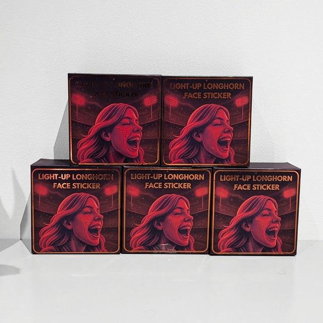 Stack of Neon Cowboys Light-Up Longhorn LED face sticker boxes with cheering fan artwork, led face jewelry and rave face gems for game day, tailgates, concerts, raves and festival makeup looks, Neon Cowboys