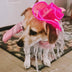 Golden Retriever wearing pink LED cowboy hat with fringe - Stylish pet wearing Western-themed light-up accessory