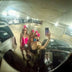 Group of women in glowing pink LED light-up mini cowboy hats taking a mirror selfie in a parking garage, matching neon cowgirl hats and space cowgirl accessories for bachelorette parties, raves, music festivals and Vegas nights, Neon Cowboys