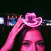 Woman wearing a pink glowing LED light-up mini cowboy hat on a headband at a night music festival, a neon cowgirl hat and space cowgirl accessory for raves, music festivals, bachelorette parties and disco cowgirl looks, Neon Cowboys