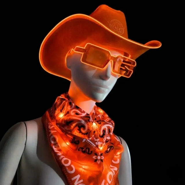 Neon Cowboy Bundle, mannequin in an orange LED light-up cowboy hat with matching glow bandana and led sunglasses, a neon cowboy hat, light up bandana and party sunglasses party set for raves, music festivals, bachelorette and western costume parties, Neon Cowboys