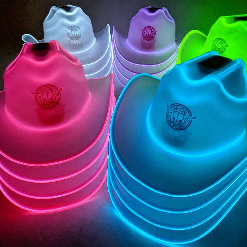Group of clear plastic light up cowboy hats glowing pink, blue, green, purple and white with colored edge lights, led cowboy hat and neon cowboy hat with glow in the dark brim for raves, music festivals, country concerts, and bachelorette parties, Neon Cowboys