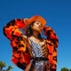Orange cowgirl hat with LED lights glowing for Austin festival fashion Texas country music concerts and western costume celebrations