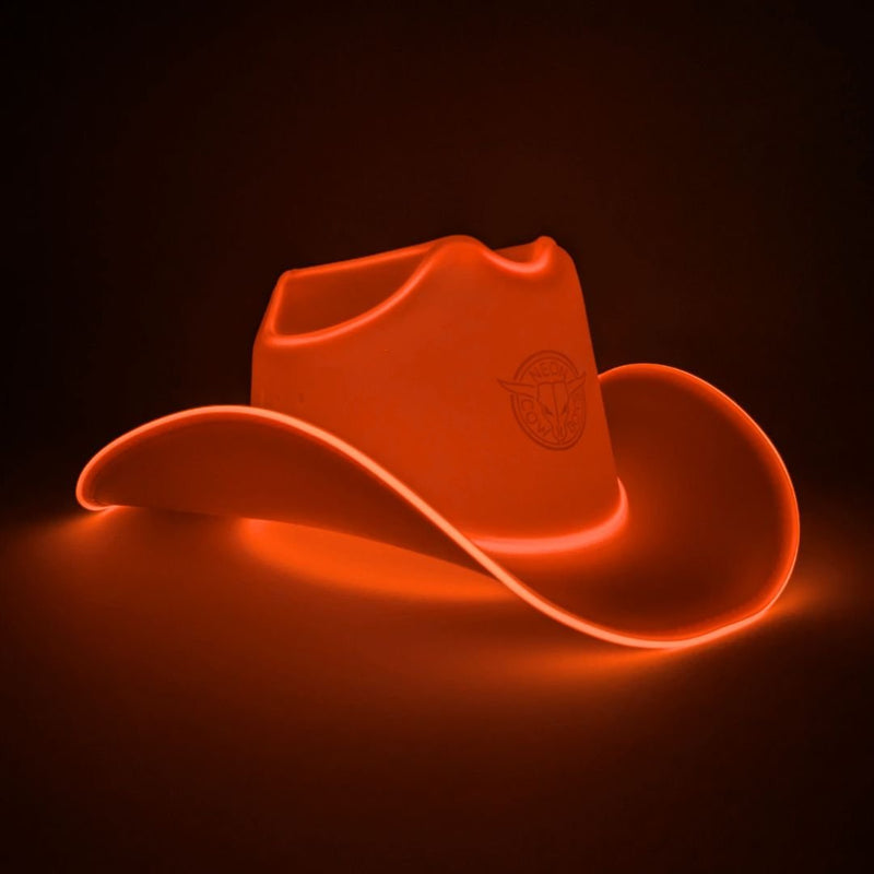 Orange glowing light up LED cowboy hat with a lit brim edge on a dark background, a neon cowboy hat and glow cowboy hat perfect for Texas tailgating parties, sporting events, Austin festival celebrations and country concerts, Neon Cowboys