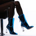 Black transparent boots with blue LED lighting against white background showing contrast between dark material and vibrant illumination