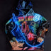 Close-up of animated Neon Cowboys hoodie design showing glowing blue and pink graphics ideal for rave outfits and festival fashion statements