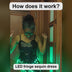 How the LED Fringe Sequin Dress works: the black sequin dress worn at night, its rechargeable USB battery pack, the remote picking one solid color or cycling colors, shown in black and silver sequins — Neon Cowboys