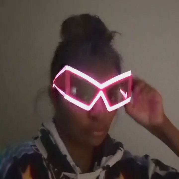 LED Space Sunglasses Video - Woman Wearing Light Up Eyewear - Illuminated Glowing Space Cowgirl Glasses at Night Events for Halloween Costumes and Mardi Gras
