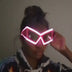 LED Space Sunglasses Video - Woman Wearing Light Up Eyewear - Illuminated Glowing Space Cowgirl Glasses at Night Events for Halloween Costumes and Mardi Gras