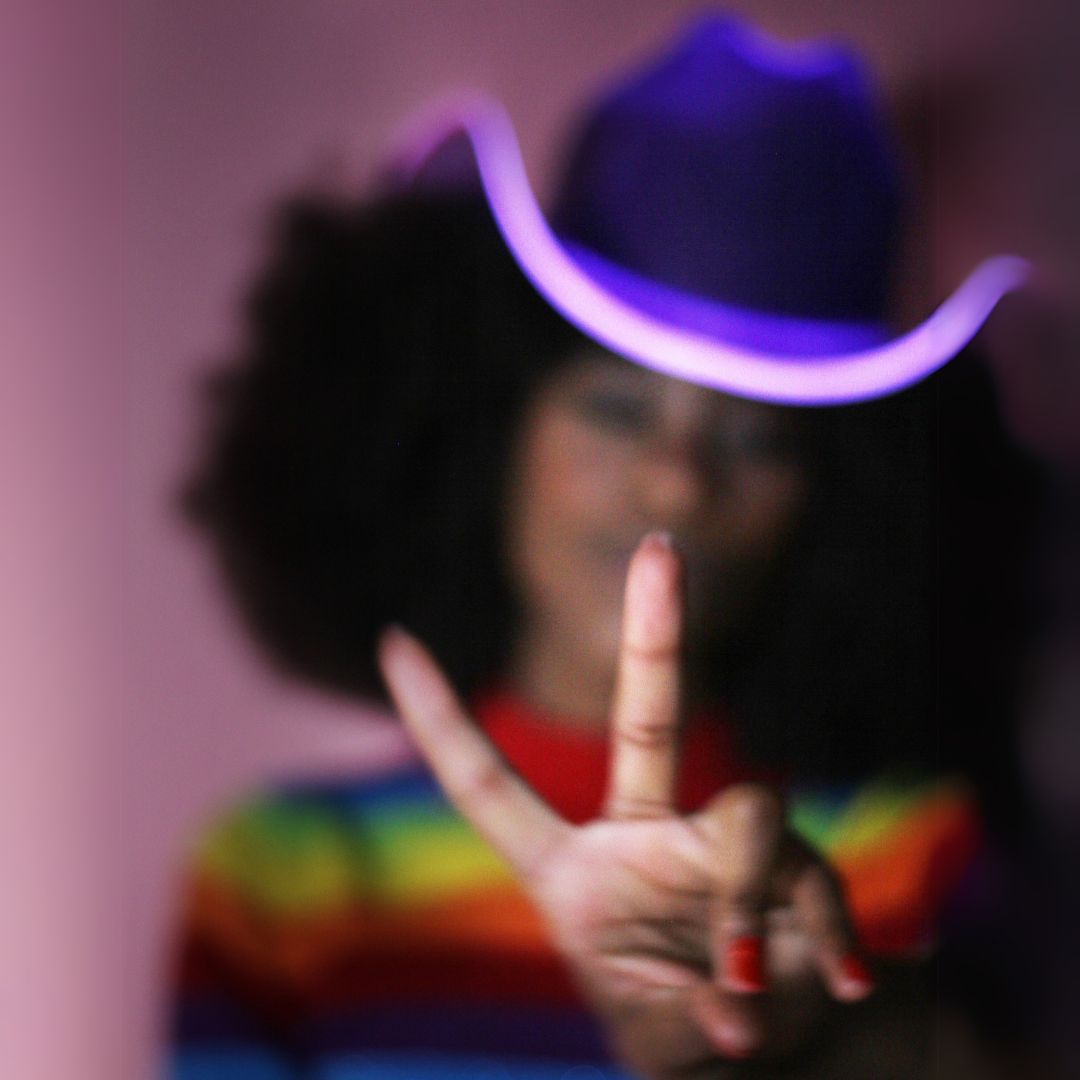 Purple cowgirl hat with bright LED lights glowing perfect for rave festivals dance parties and western costume fashion