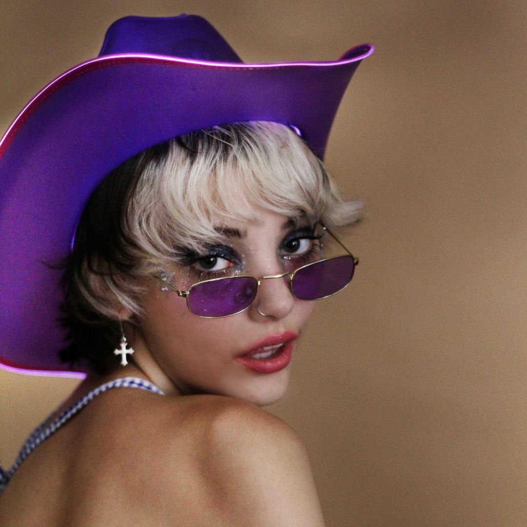 Purple LED cowgirl hat glowing vibrant ideal for Burning Man festival outfits desert parties and western rave costumes