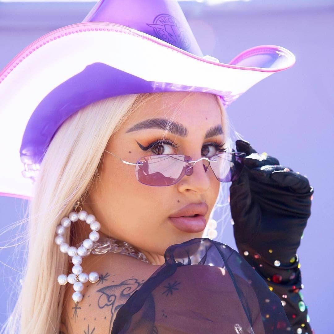 Purple neon cowboy hat with LED lights ideal for masquerade ball costume parties western themes and luxury event celebrations