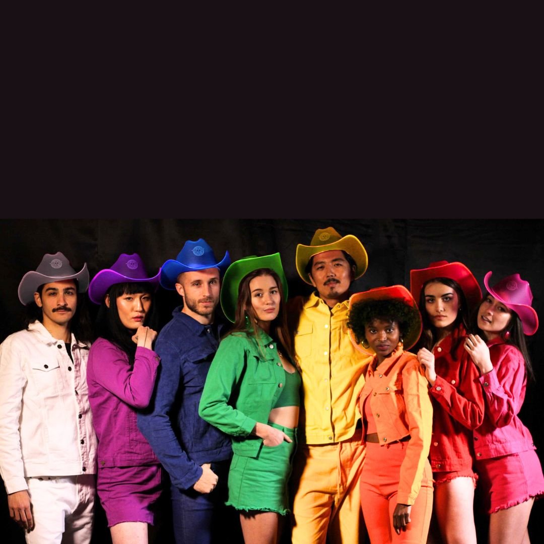 Group of friends wearing colorful light up cowboy hats at party creating vibrant coordinated look for festival squads and themed celebration outfits