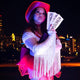 Red cowboy hat with bright LED lights perfect for concert performance stages music festival outfits and western costumes