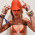 Red LED neon cowgirl hat glowing bright for luxury yacht parties summer events and western costume fashion celebrations