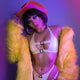 Red LED neon cowgirl hat with latex perfect for Pride celebrations queer events and western costume fashion outfits