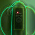 Close-up of Limited Edition Neon Cowboys Hat logo detail - Acid green LED illumination highlighting branded embossed logo on hat
