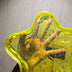 Hand pressed behind a yellow clear light up star purse showing the transparent holographic star panel, light up crossbody bag and clear bag concert accessory for music festivals, EDM raves, and stadium concerts, Neon Cowboys